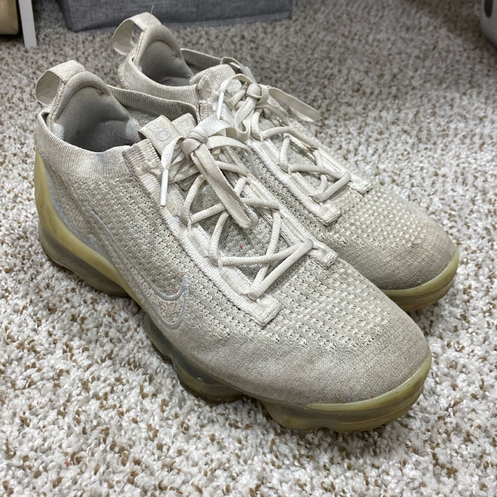 white nike athletic sneakers